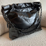 CHANEL Handbag So Black Calfskin Quilted Drawstring 22 Bag small Black Hardware - Redeluxe