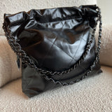 CHANEL Handbag So Black Calfskin Quilted Drawstring 22 Bag small Black Hardware - Redeluxe