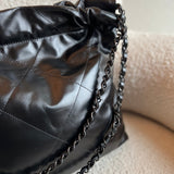CHANEL Handbag So Black Calfskin Quilted Drawstring 22 Bag small Black Hardware - Redeluxe