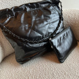 CHANEL Handbag So Black Calfskin Quilted Drawstring 22 Bag small Black Hardware - Redeluxe