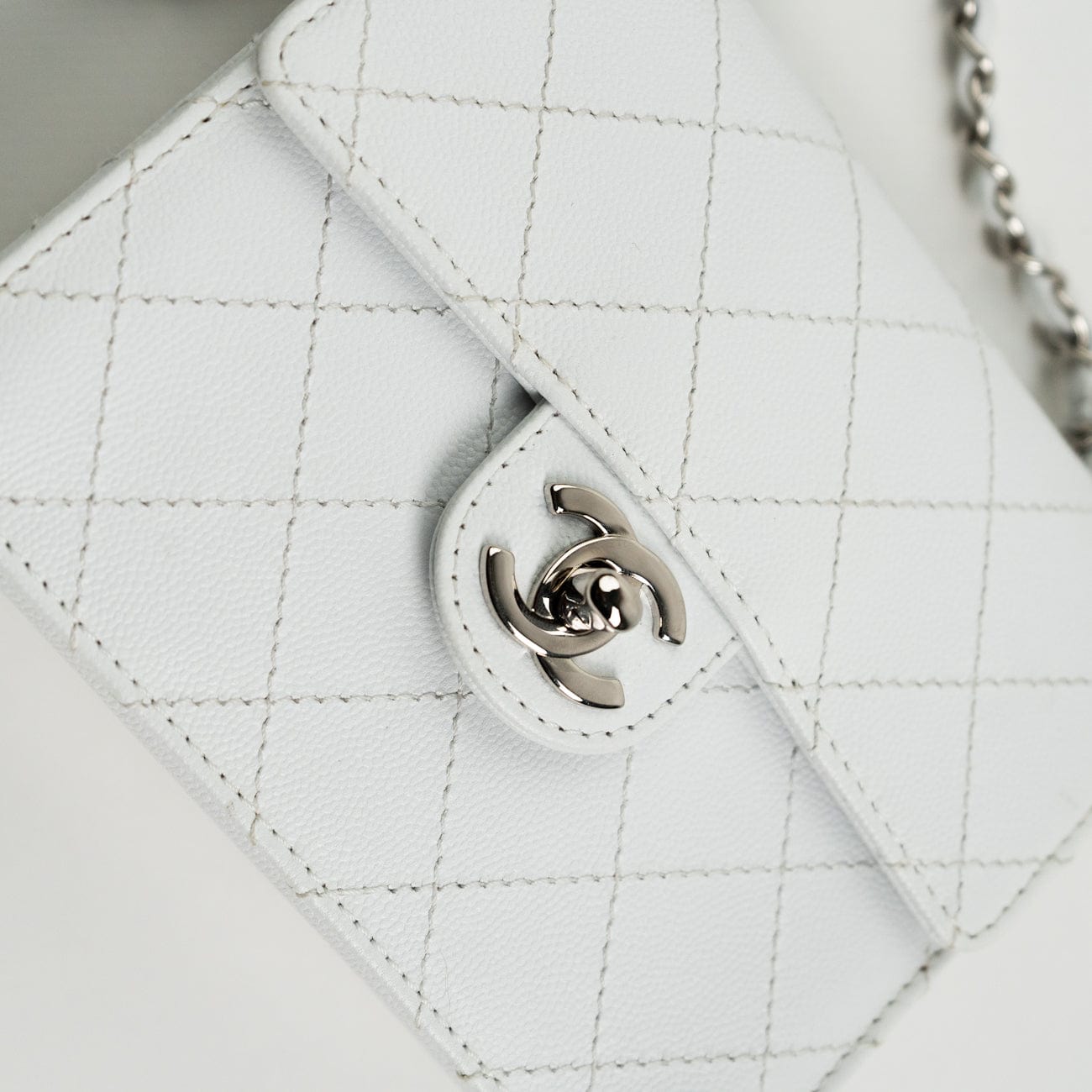 CHANEL Handbag Vintage White Mini Square Caviar Quilted Silver Hardware - Redeluxe