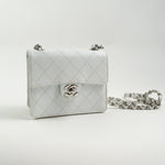 CHANEL Handbag Vintage White Mini Square Caviar Quilted Silver Hardware - Redeluxe
