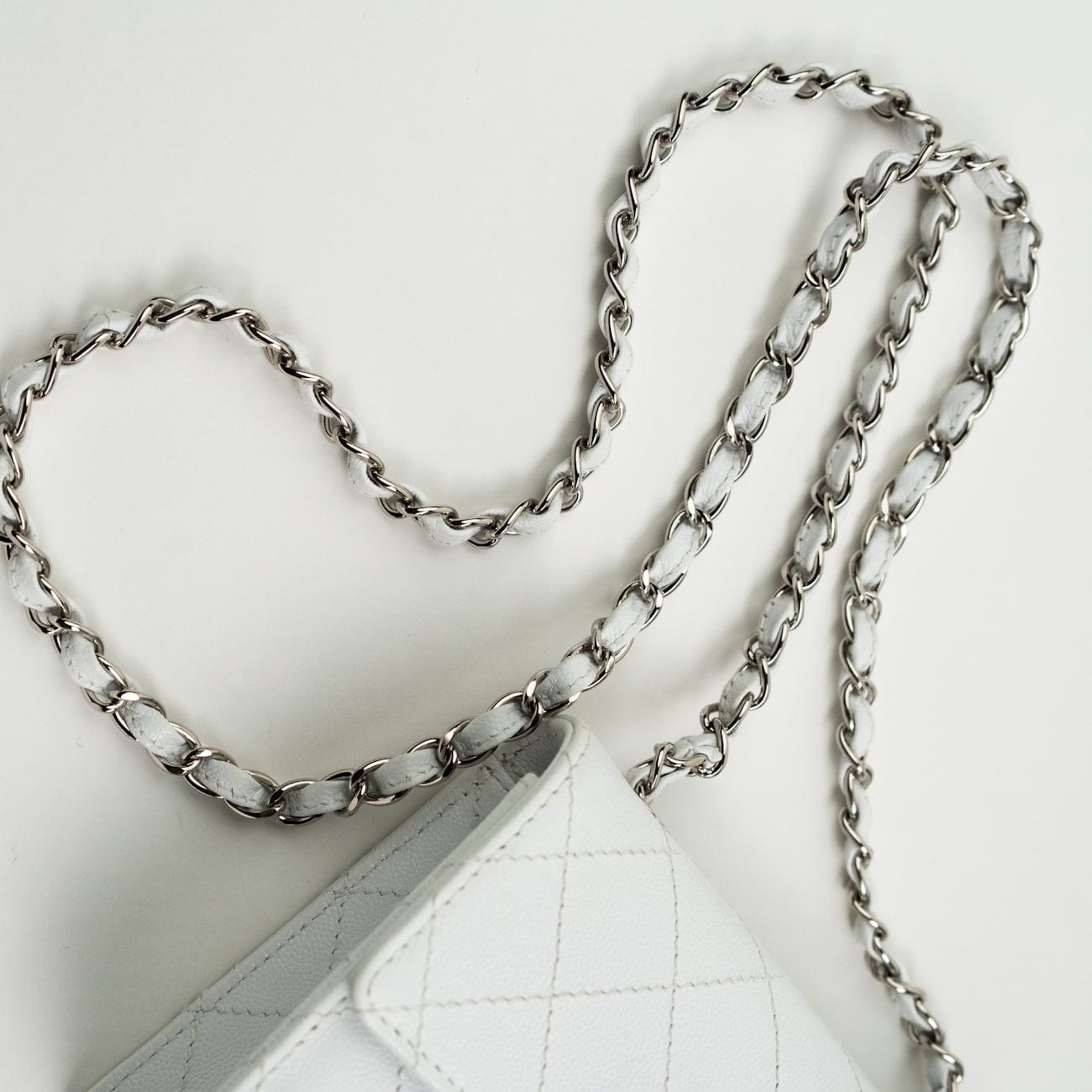 CHANEL Handbag Vintage White Mini Square Caviar Quilted Silver Hardware - Redeluxe