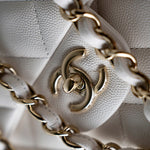 CHANEL Handbag White 21S Jumbo White Caviar Quilted Classic Flap Light Gold Hardware - Redeluxe