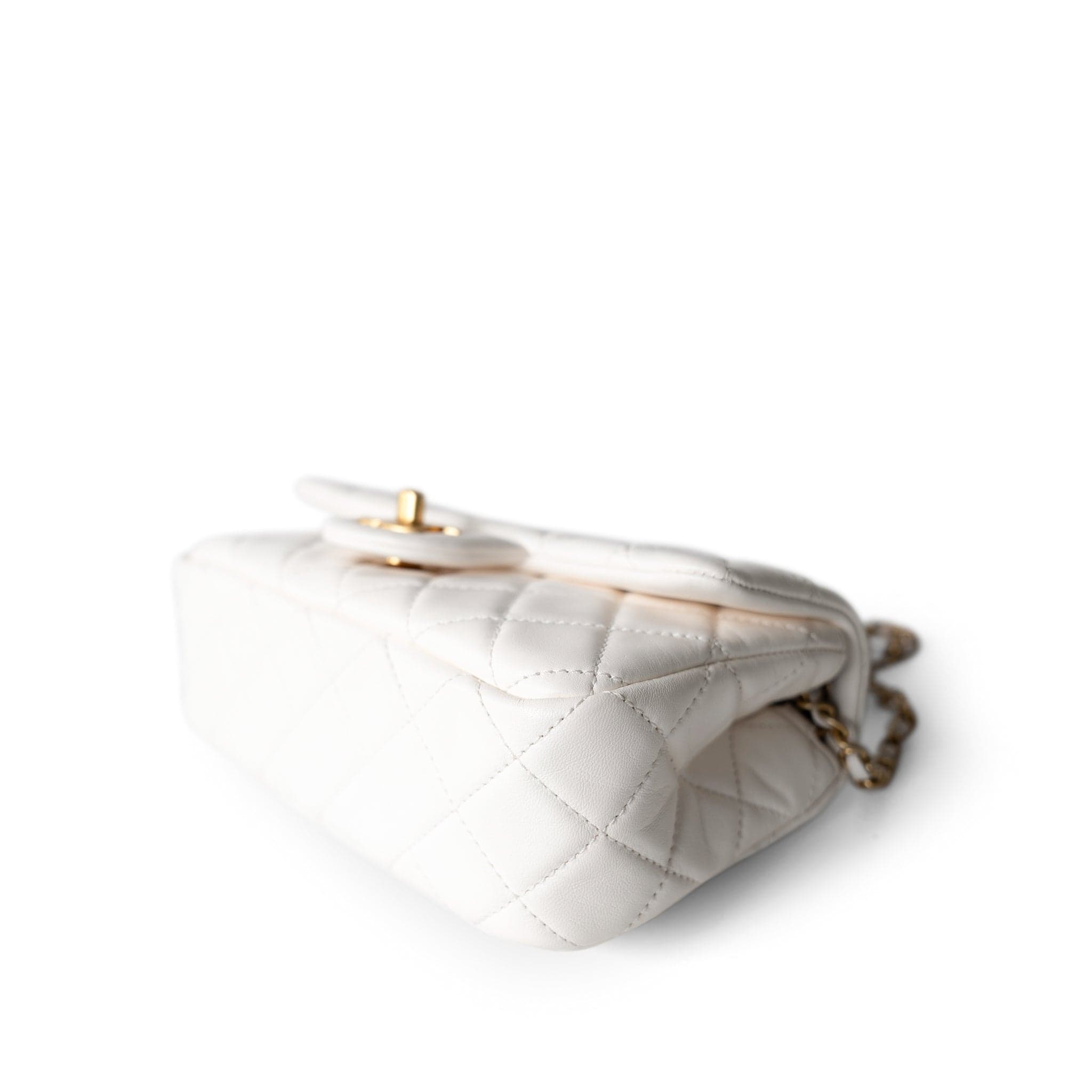 CHANEL Handbag White / Seasonal 21B White Lambskin Quilted Mini Rectangular Pearl Crush Antique Gold Hardware - Redeluxe