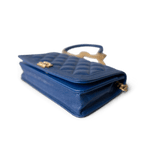 CHANEL Handbag WOC / Blue 19A Blue Caviar Quilted Boy Wallet On Chain WOC Antique Gold Hardware - Redeluxe