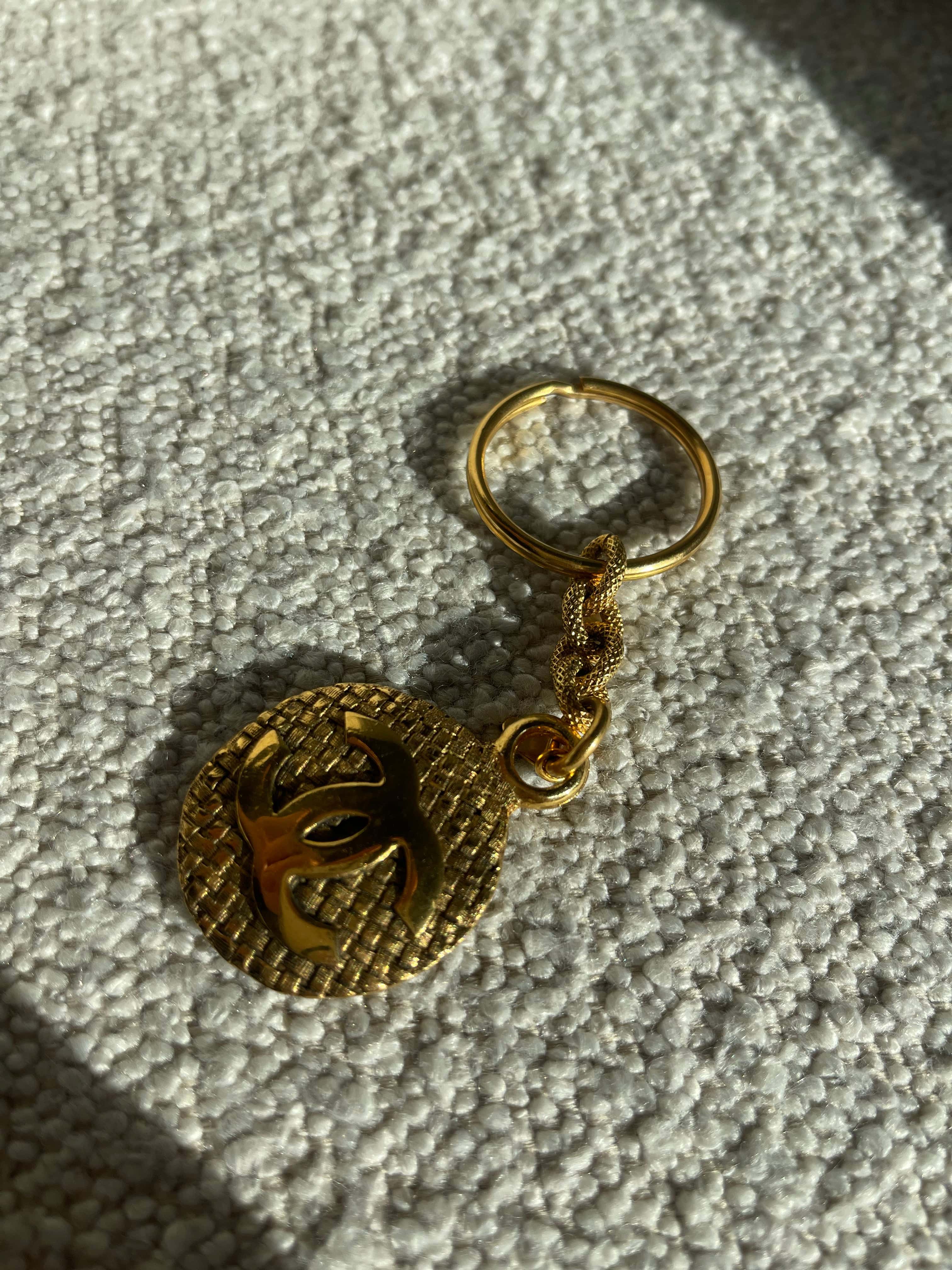 CHANEL Key Holder Gold Chanel Vintage Gold-tone Metal Round Coco Mark Charm Keyholder - Redeluxe