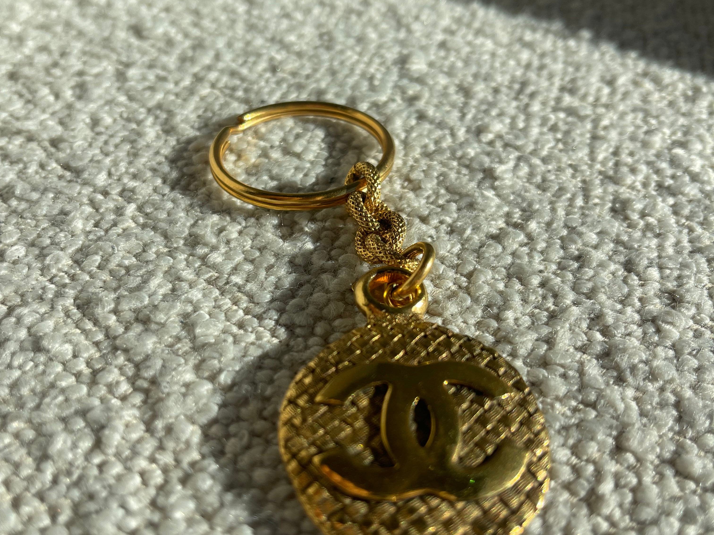 CHANEL Key Holder Gold Chanel Vintage Gold-tone Metal Round Coco Mark Charm Keyholder - Redeluxe