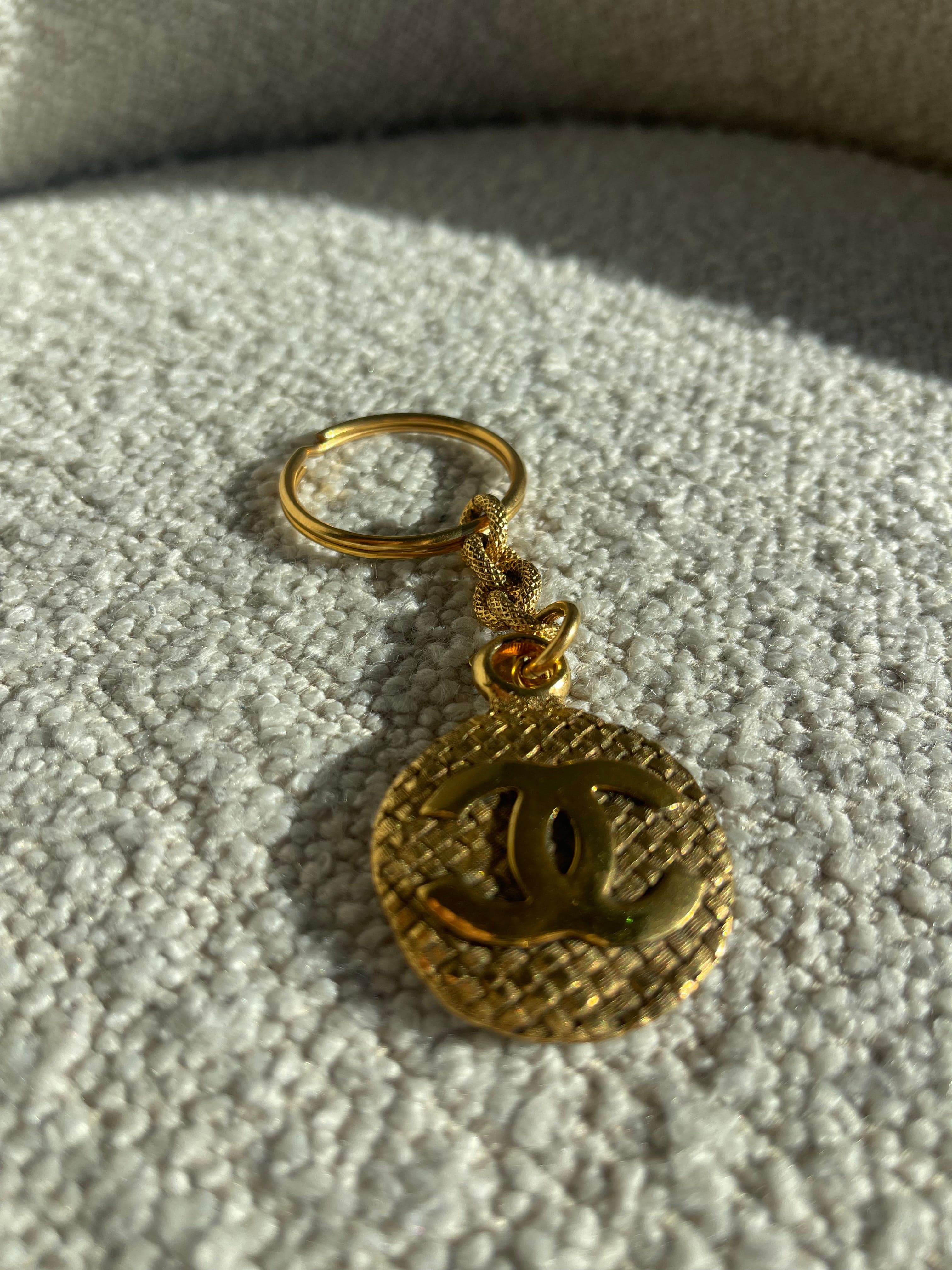 CHANEL Key Holder Gold Chanel Vintage Gold-tone Metal Round Coco Mark Charm Keyholder - Redeluxe
