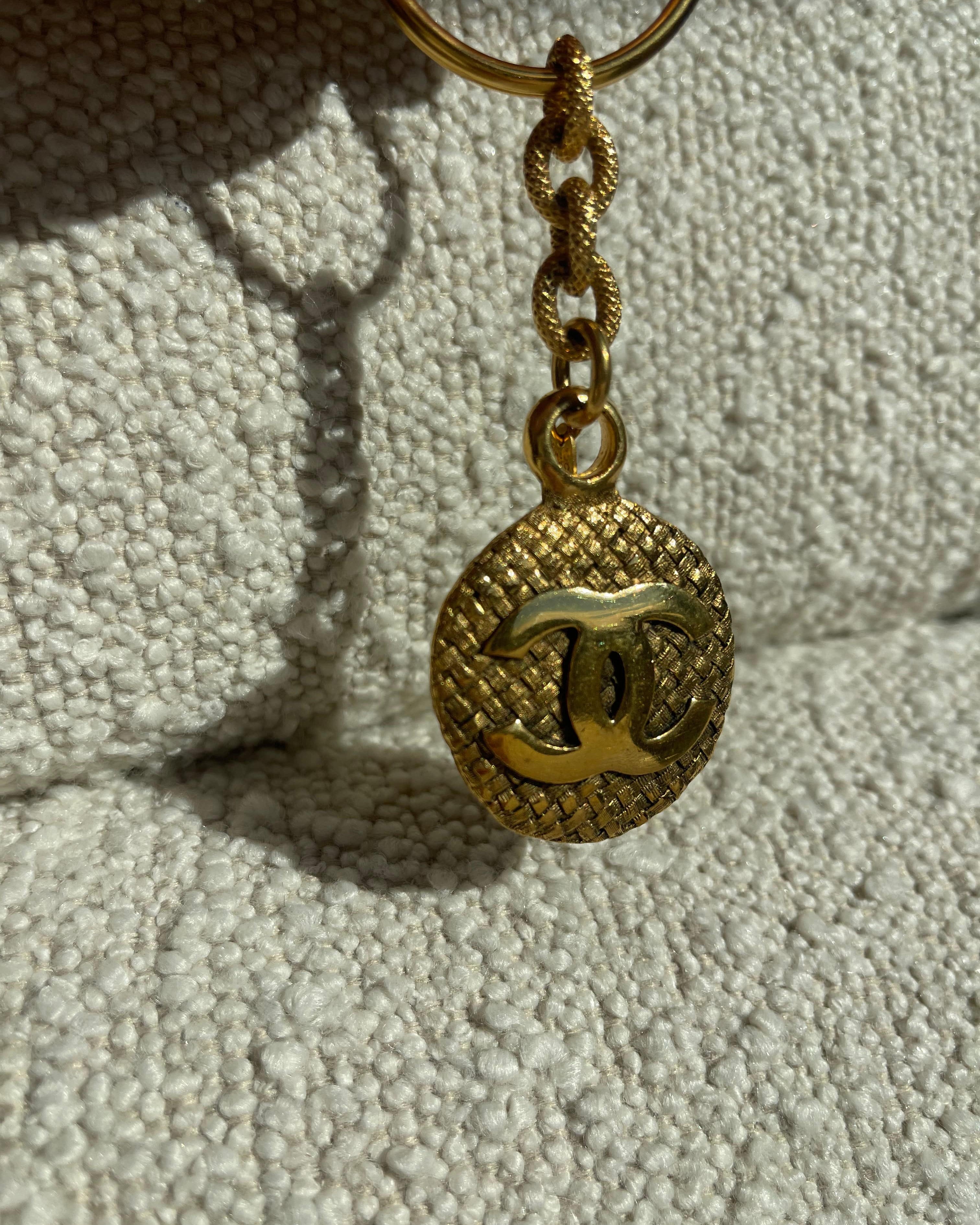 CHANEL Key Holder Gold Chanel Vintage Gold-tone Metal Round Coco Mark Charm Keyholder - Redeluxe