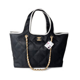 CHANEL Tote 23M Coco Maxi Beach Shopping Tote Black Quilted - Redeluxe