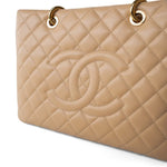 CHANEL Tote Beige Beige Clair Caviar Quilted Grand Shopper Tote (GST) Gold Hardware - Redeluxe