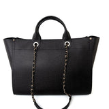 CHANEL Tote Black Caviar Studded Deauville Tote Medium/ Large Light Gold Hardware - Redeluxe