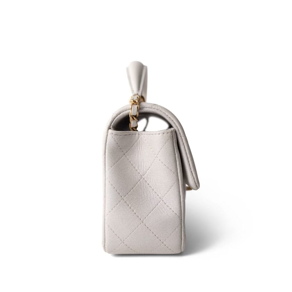CHANEL White Mini Top Handle Pearly White Iridescent Lambskin Quilted Aged Gold Hardware - Redeluxe