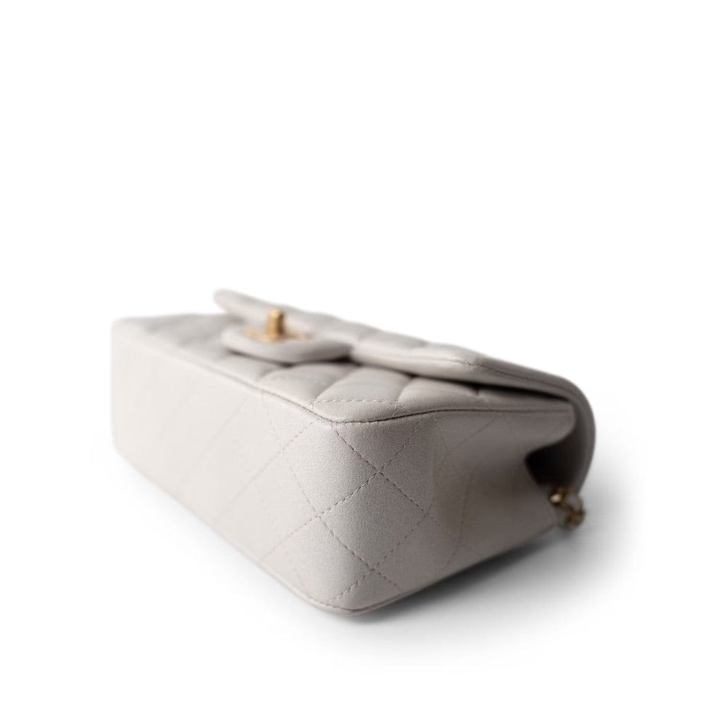 CHANEL White Mini Top Handle Pearly White Iridescent Lambskin Quilted Aged Gold Hardware - Redeluxe