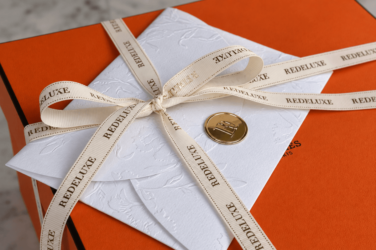 Redeluxe tissue packaging around a Chanel item