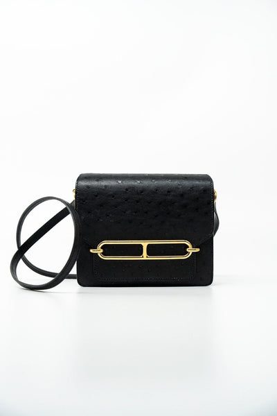Buy HERMÈS Mini Roulis Black Ostrich Leather Gold Hardware