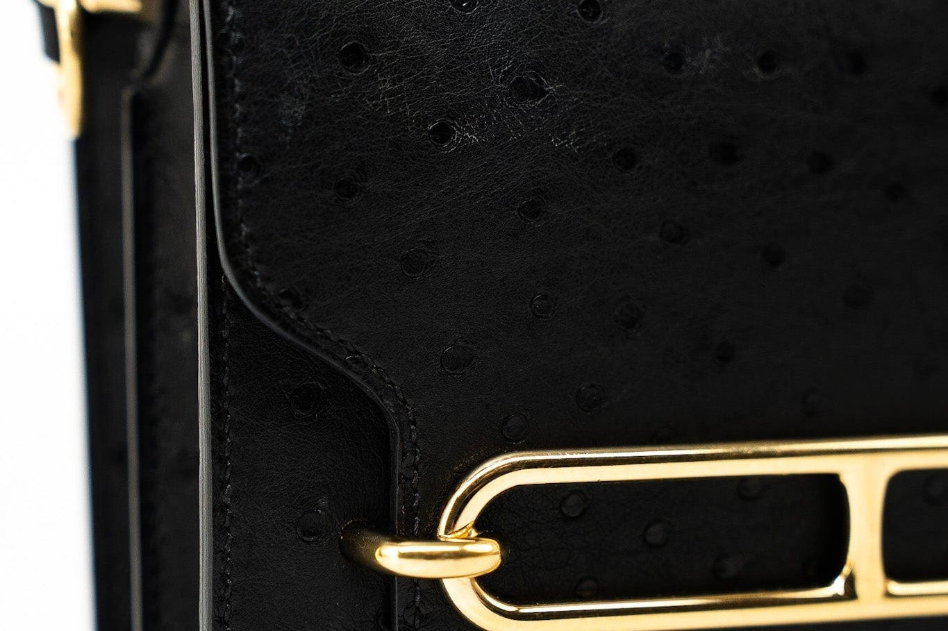Hermes Handbag Hermès  Mini Roulis Black Ostrich Leather Gold Hardware - Redeluxe
