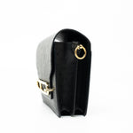 Hermes Handbag Hermès  Mini Roulis Black Ostrich Leather Gold Hardware - Redeluxe