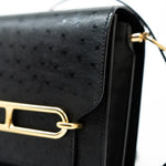 Hermes Handbag Hermès  Mini Roulis Black Ostrich Leather Gold Hardware - Redeluxe