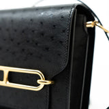 Hermes Handbag Hermès  Mini Roulis Black Ostrich Leather Gold Hardware - Redeluxe