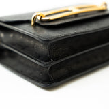 Hermes Handbag Hermès  Mini Roulis Black Ostrich Leather Gold Hardware - Redeluxe