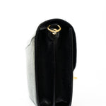 Hermes Handbag Hermès  Mini Roulis Black Ostrich Leather Gold Hardware - Redeluxe