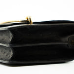 Hermes Handbag Hermès  Mini Roulis Black Ostrich Leather Gold Hardware - Redeluxe