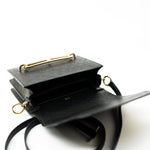 Hermes Handbag Hermès  Mini Roulis Black Ostrich Leather Gold Hardware - Redeluxe