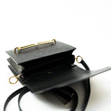 Hermes Handbag Hermès  Mini Roulis Black Ostrich Leather Gold Hardware - Redeluxe