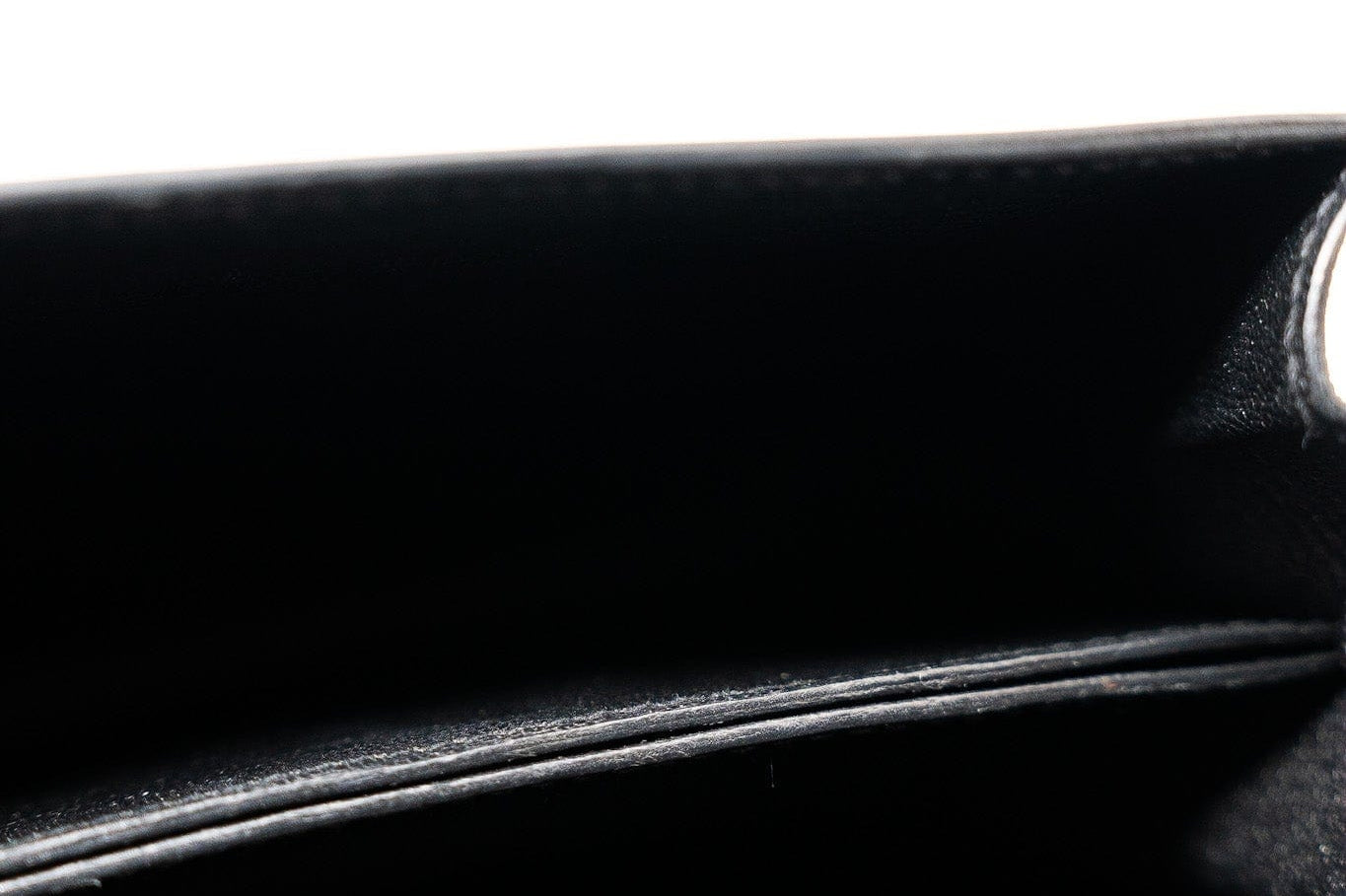 Hermes Handbag Hermès  Mini Roulis Black Ostrich Leather Gold Hardware - Redeluxe