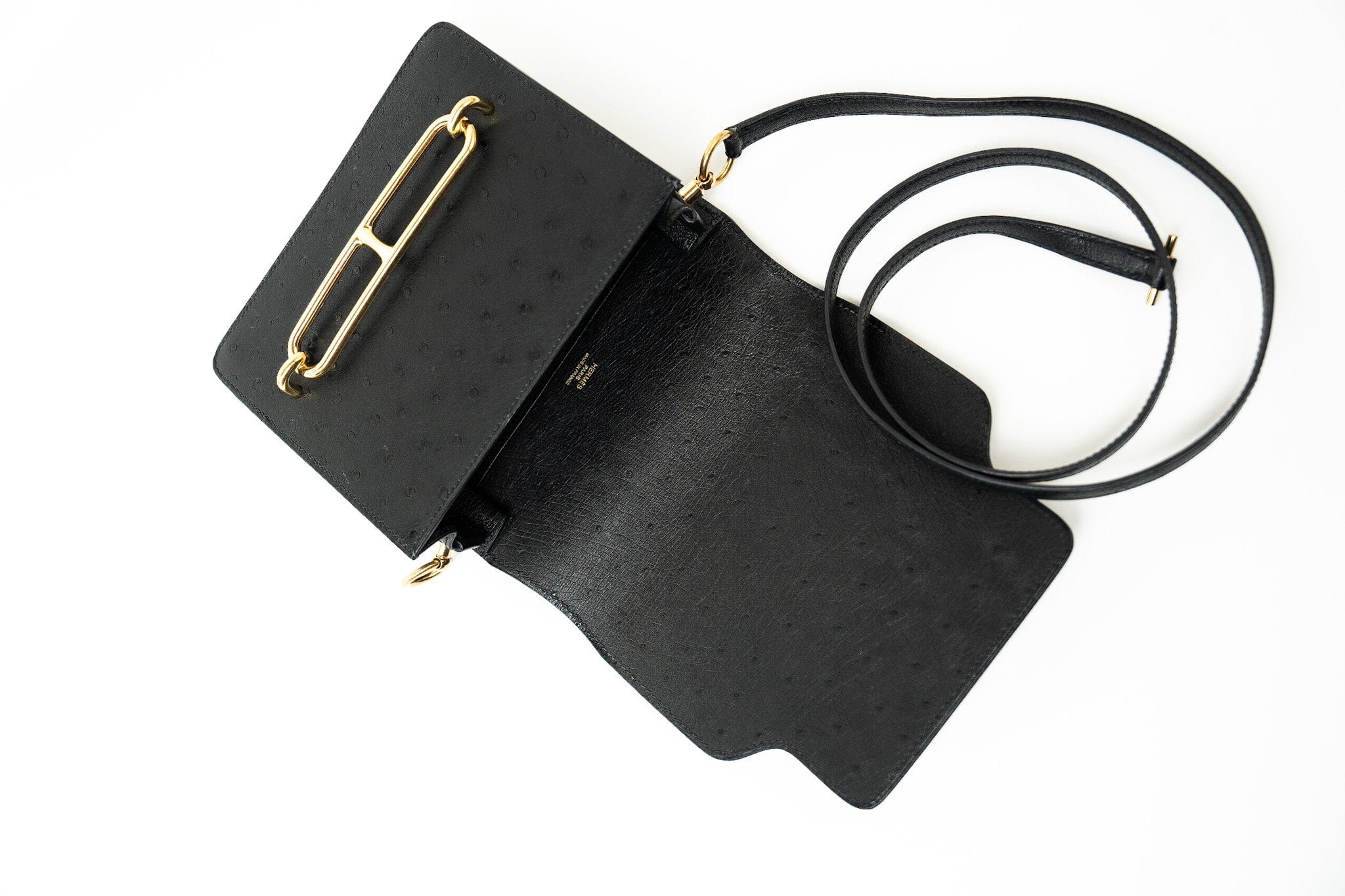 Hermes Handbag Hermès  Mini Roulis Black Ostrich Leather Gold Hardware - Redeluxe