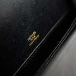 Hermes Handbag Hermès  Mini Roulis Black Ostrich Leather Gold Hardware - Redeluxe