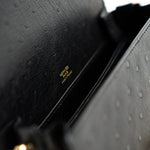Hermes Handbag Hermès  Mini Roulis Black Ostrich Leather Gold Hardware - Redeluxe