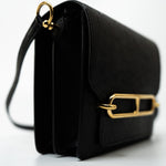 Hermes Handbag Hermès  Mini Roulis Black Ostrich Leather Gold Hardware - Redeluxe