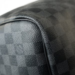 Louis Vuitton Duffle Bag Louis Vuitton Keepall 55 Bandouliere in Damier Graphite Canvas - Redeluxe