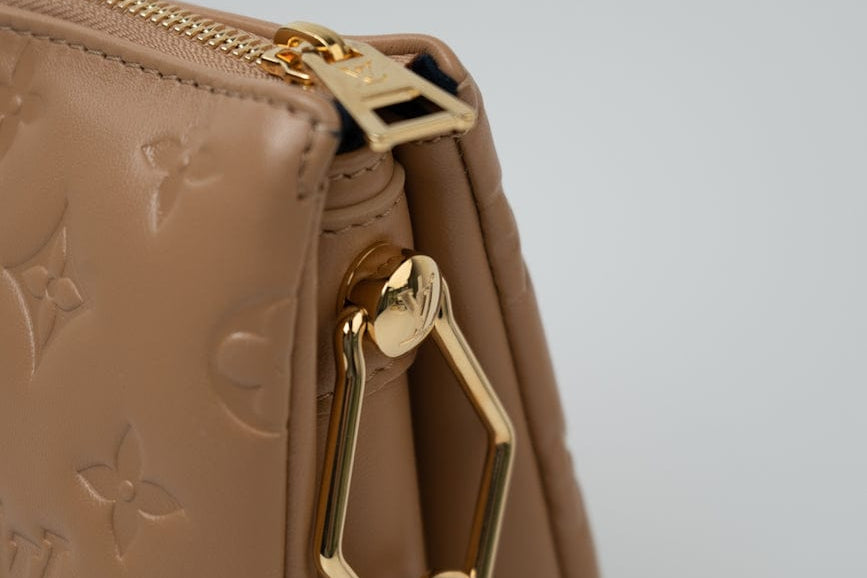 Louis Vuitton Handbag Brown Louis Vuitton Monogram Coussin PM Camel Lambskin Embossed - Redeluxe