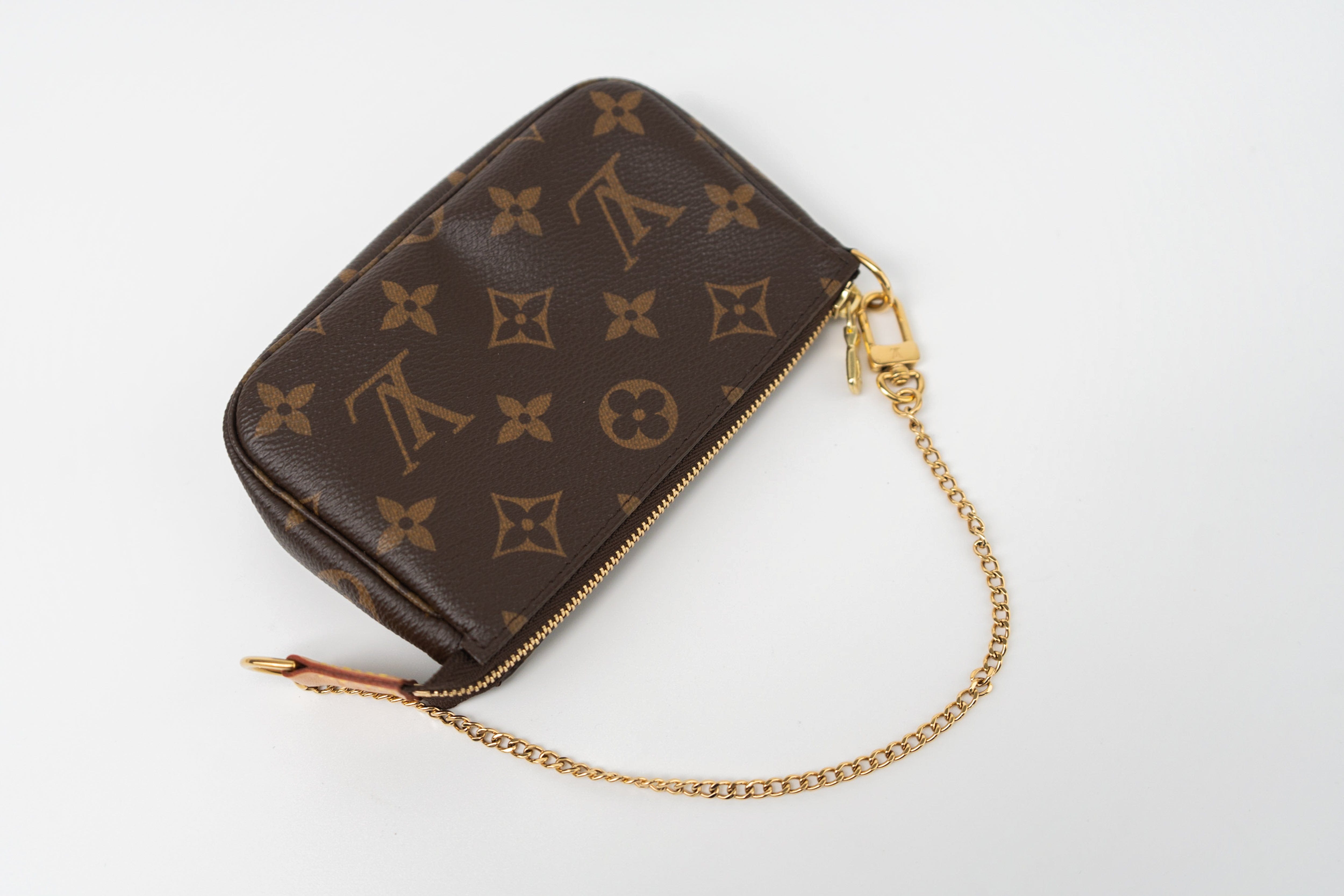 Louis Vuitton Handbag Louis Vuitton Monogram Mini Pochette Accessories - Redeluxe