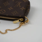 Louis Vuitton Handbag Louis Vuitton Monogram Mini Pochette Accessories - Redeluxe