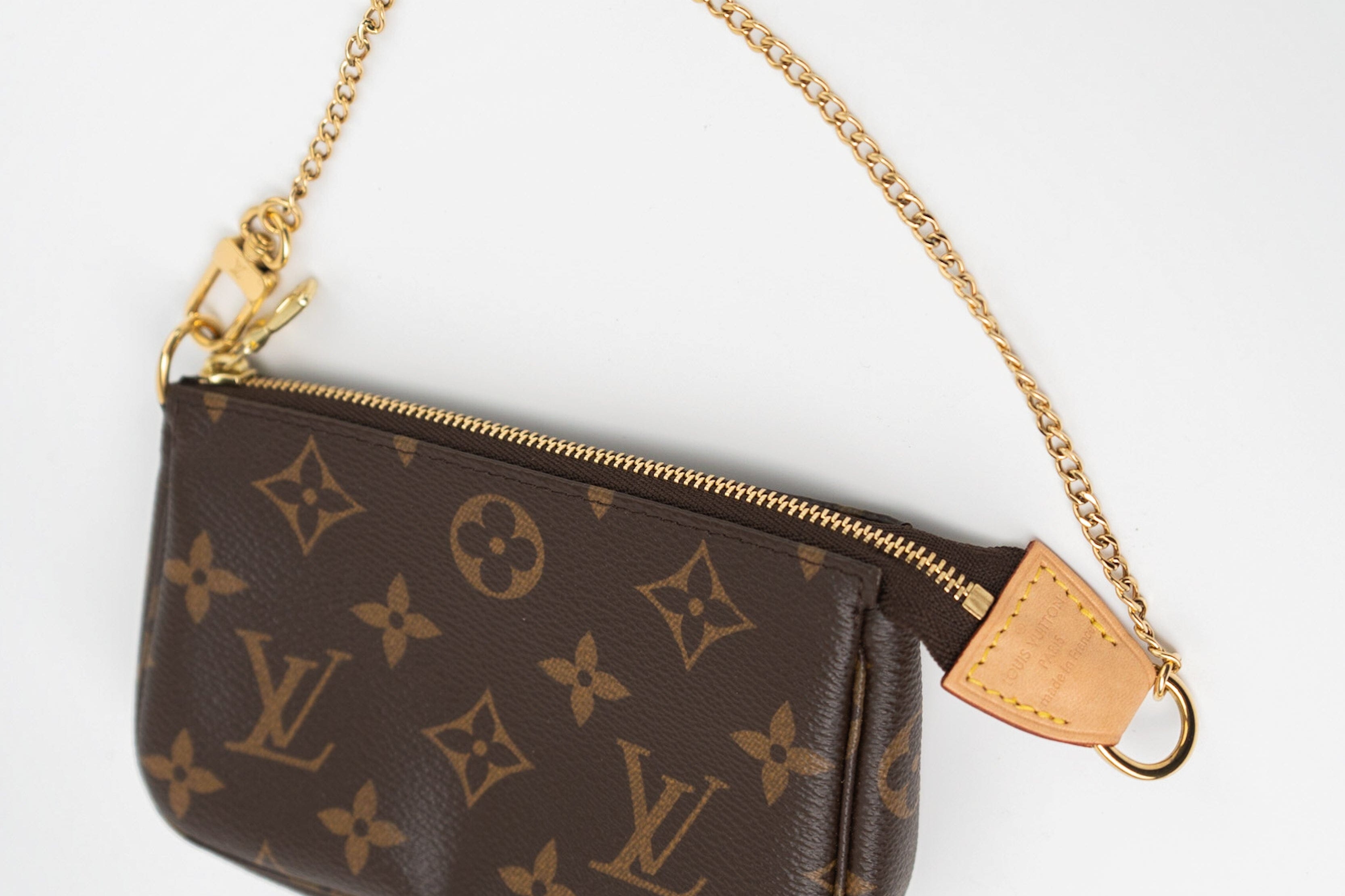 Louis Vuitton Handbag Louis Vuitton Monogram Mini Pochette Accessories - Redeluxe