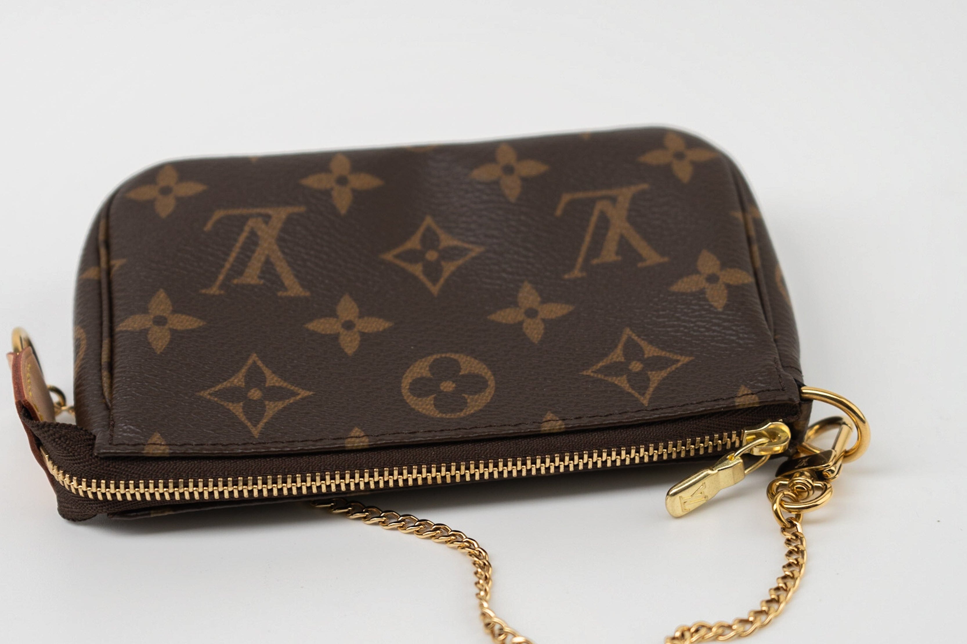 Louis Vuitton Handbag Louis Vuitton Monogram Mini Pochette Accessories - Redeluxe
